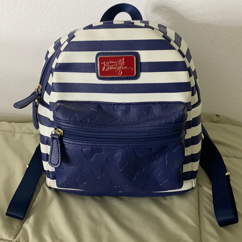 royal blue and white Disney Boutique mini backpack